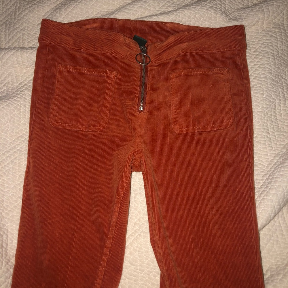 Orange corduroy zip up pants